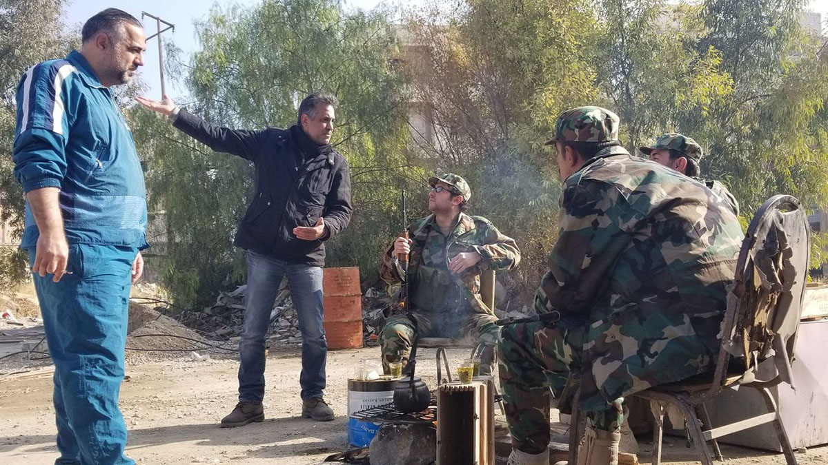 Director Aref Tawil prepares a scene in Rozanna, 
(Nabih Bulos / For The Times)